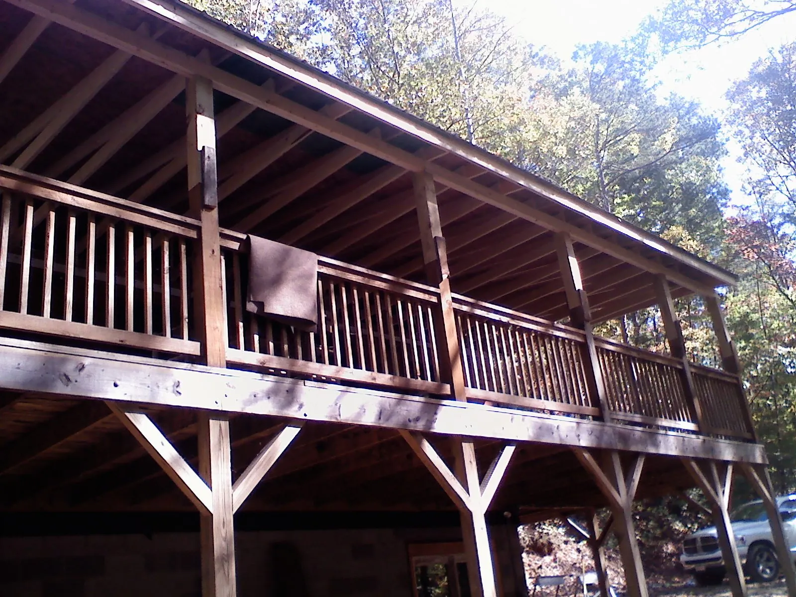 Timber framing under a new elevated porch and deck — Roof Leak Repair in Jeffersonville by Roofing Brothers